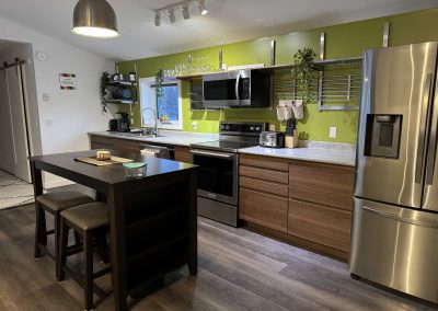 full kitchen with dining area